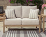 Hallow Creek Outdoor Loveseat with Cushion - Atchison Furniture Company (Atchison, KS)