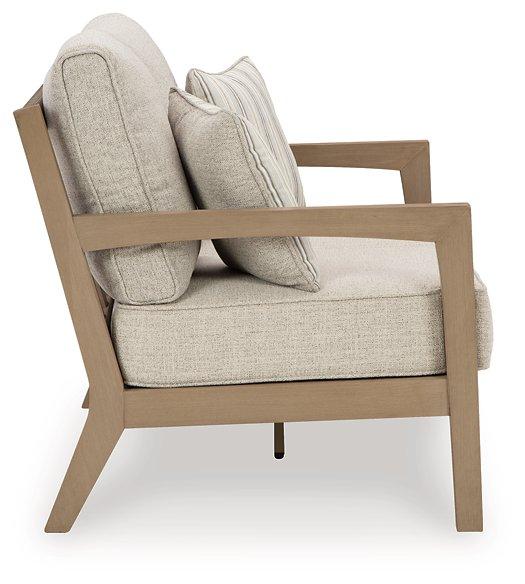 Hallow Creek Outdoor Loveseat with Cushion - Atchison Furniture Company (Atchison, KS)