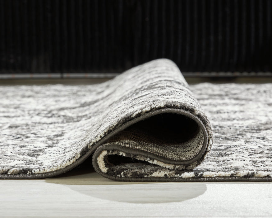 Glennisman Medium Rug - Atchison Furniture Company (Atchison, KS)