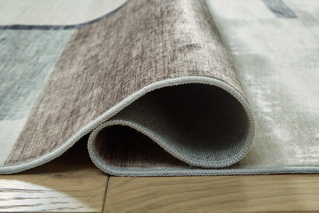 Larkport Washable Area Rug - Atchison Furniture Company (Atchison, KS)