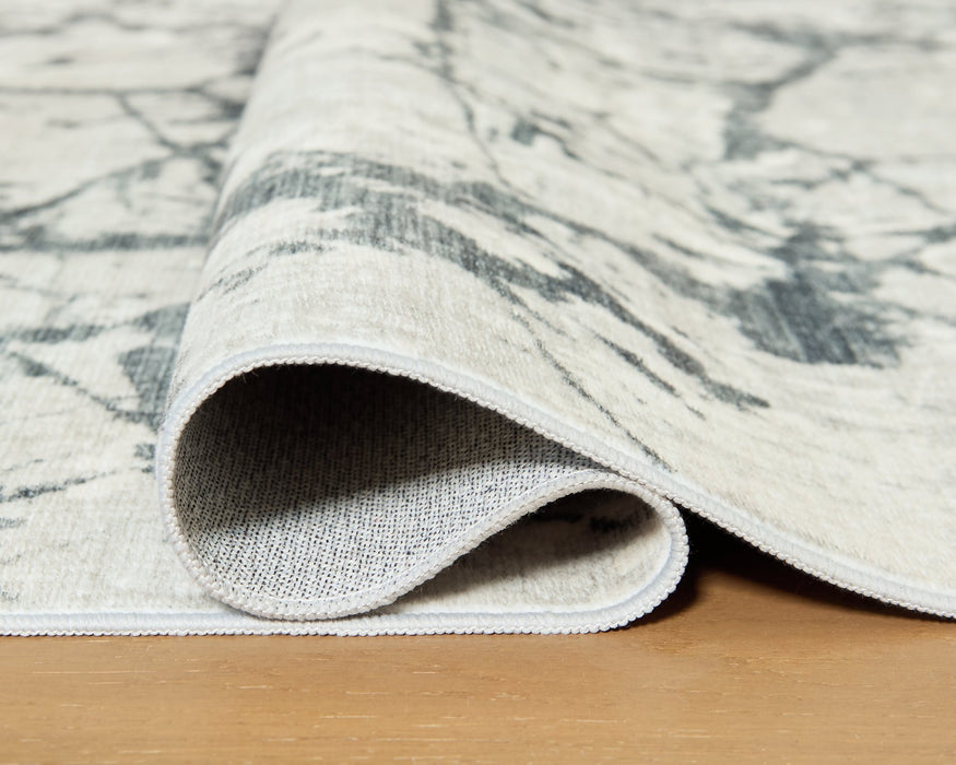 Tobinbury Washable Area Rug - Atchison Furniture Company (Atchison, KS)