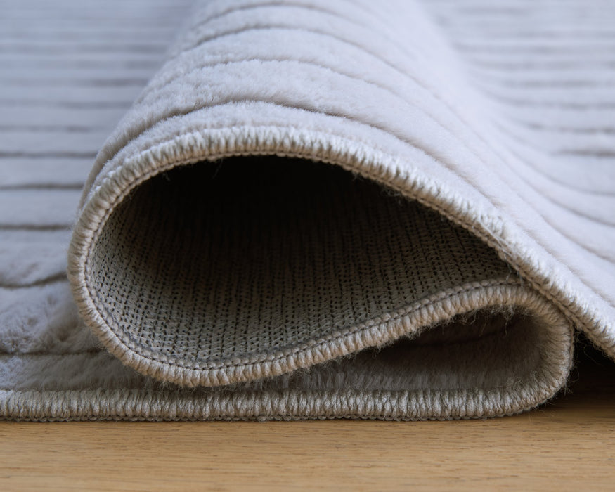 Worthley Washable Area Rug - Atchison Furniture Company (Atchison, KS)