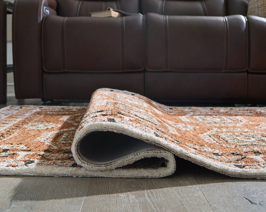 Qaabiz Area Rug - Atchison Furniture Company (Atchison, KS)