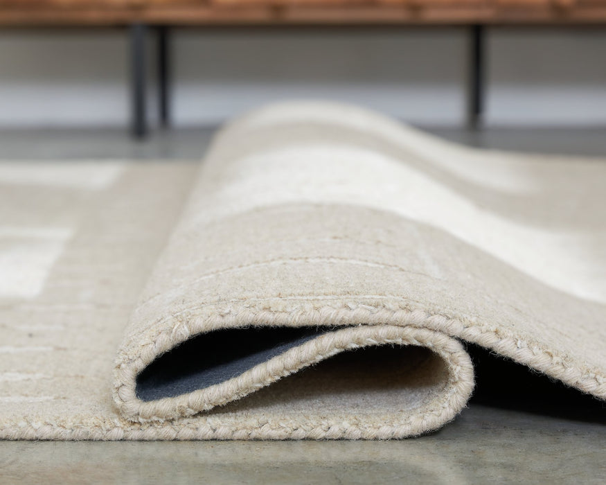 Wolbert 7'8" x 10' Area Rug - Atchison Furniture Company (Atchison, KS)