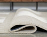Wolbert 5' x 7' Area Rug - Atchison Furniture Company (Atchison, KS)