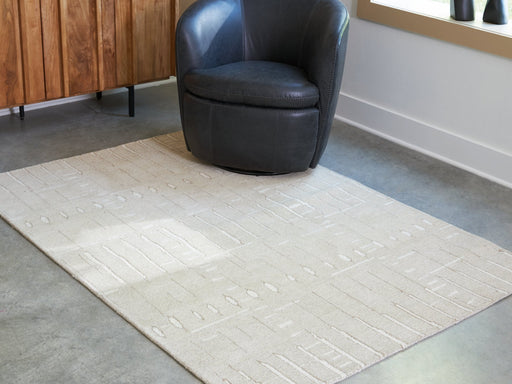 Wolbert 5' x 7' Area Rug - Atchison Furniture Company (Atchison, KS)